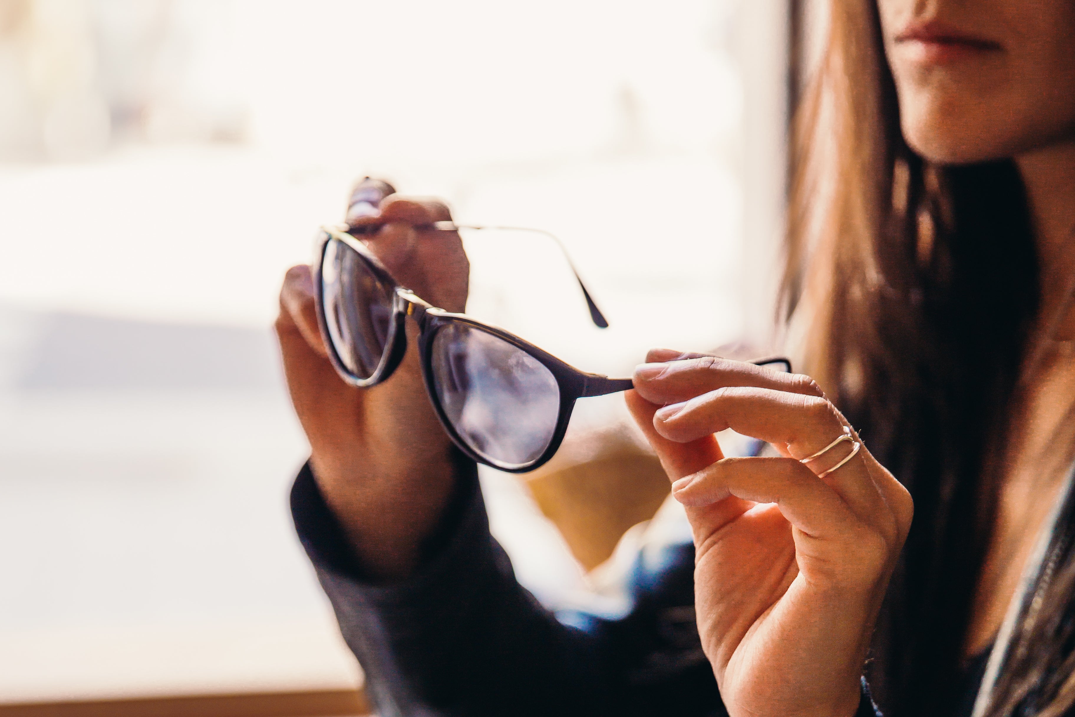 files/woman-trying-on-sunglasses.jpg